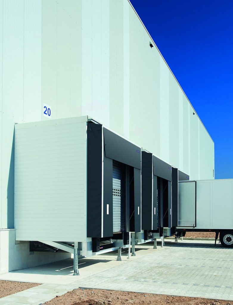 Abri de quai sur mesure protection intempéries poste chargement