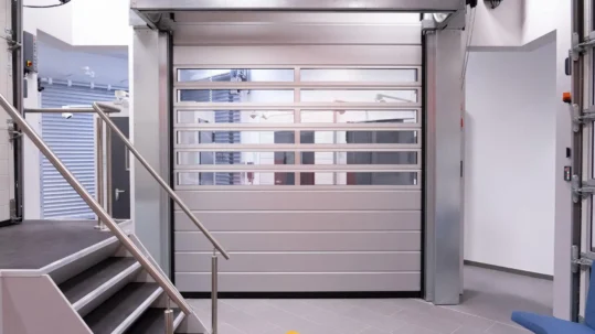 Porte sectionnelle à enroulement rapide
