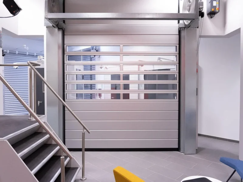 Porte sectionnelle à enroulement rapide